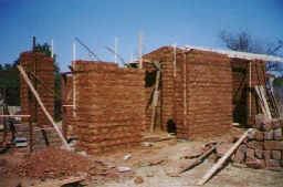 earth bricks made using local materials and labor